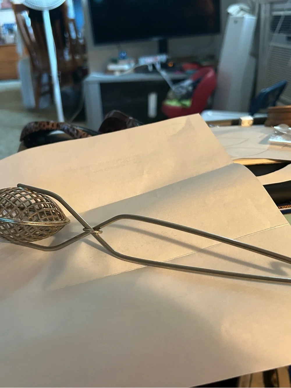 Vintage Metal Tea Infuser - Silver Tone. It is a versatile utensil.
